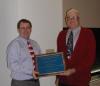 Dr. Morris Bitzer receives a plaque commemorating the 2003 "S. H. Phillips Distinguished Lecture in No-Till Agriculture" from Dr. Michael Barrett, Chair of the Department of Agronomy.